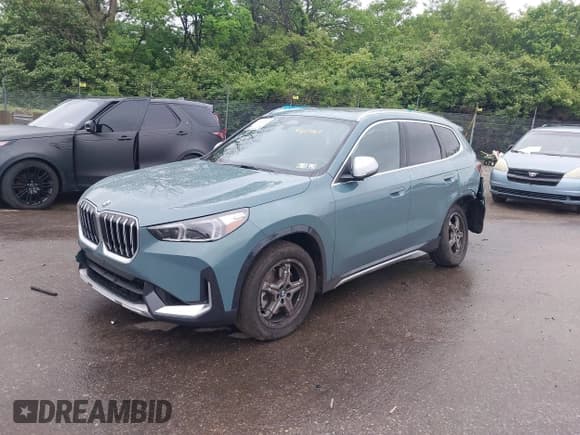 ✅ 2024 BMW X1 xDrive28i • VIN: WBX73EF03R5Y60469 • Lot: 42231110. Listed on IAAI with 6,860 mi. Free auction sales archive from the USA and detailed vehicle history report at DreamBid. Image 2.