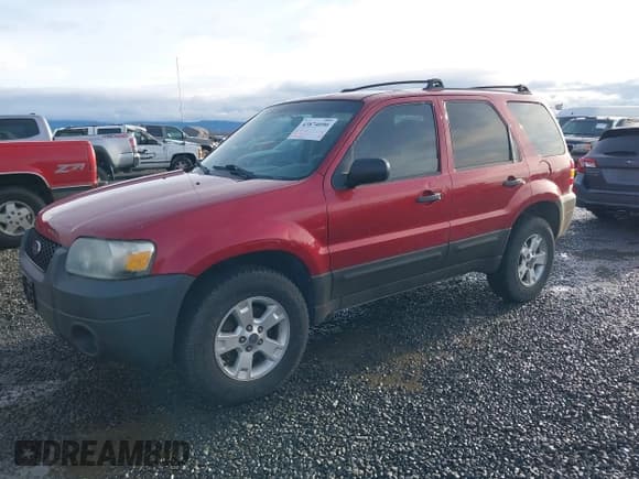 ✅ 2006 Ford Escape XLT • VIN: 1FMYU93136KC49627 • Lot: 43874090. Listed on IAAI with 204,566 mi. Free auction sales archive from the USA and detailed vehicle history report at DreamBid. Image 2.