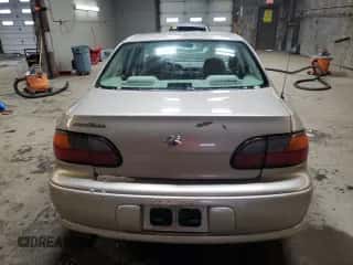 2000 Chevrolet Malibu z VIN 1G1ND52J1Y6275875, wystawiony jako Copart lot #83699264 z przebiegiem 128 288 mil mil oraz Szkoda całkowita • Salvage title. Historia ofert i sprzedaży dostępna na DreamBid. Obrazek 6.