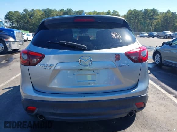 ✅ 2016 Mazda CX-5 Grand Touring • VIN: JM3KE4DY3G0609490 • Лот: 43417943. Опубликован ранее на IAAI с пробегом 243 145 миль. Бесплатный доступ к архиву аукционных продаж из США и подробный отчёт об истории автомобиля на DreamBid. Изображение 16.