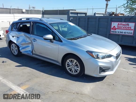 ✅ 2018 Subaru Impreza Premium • VIN: 4S3GTAD62J3752616 • Lot: 43120942. Listed on IAAI with 99,641 mi. Free auction sales archive from the USA and detailed vehicle history report at DreamBid. Image 1.