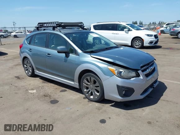 ✅ 2012 Subaru Impreza Special Sports Premium • VIN: JF1GPAL66CG202732 • Lot: 42096887. Listed on IAAI with 105,523 mi. Free auction sales archive from the USA and detailed vehicle history report at DreamBid. Image 1.