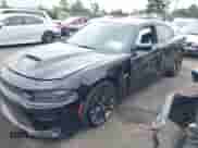 2020 Dodge Charger Scat Pack z VIN 2C3CDXGJ3LH178143, wystawiony jako IAAI lot #43295019 z przebiegiem 42 278 mil mil oraz . Historia ofert i sprzedaży dostępna na DreamBid. Obrazek 6.