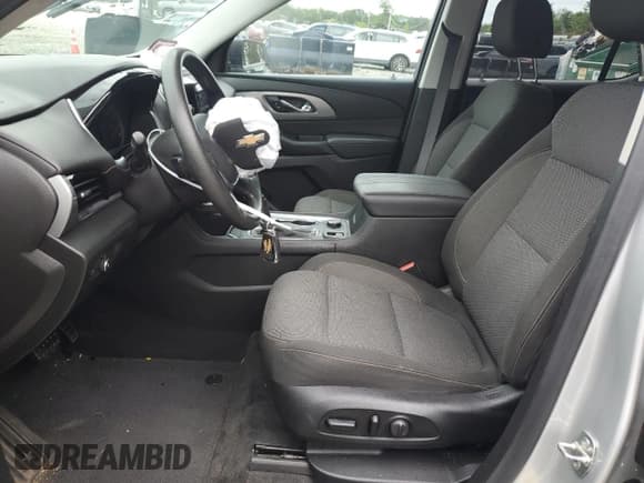 ✅ 2020 Chevrolet Traverse LS • VIN: 1GNERLKW7LJ163393 • Lot: 69497215. Listed on Copart with 103,250 mi. Free auction sales archive from the USA and detailed vehicle history report at DreamBid. Image 7.