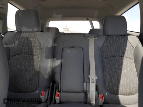 2017 Chevrolet Traverse LS z VIN 1GNKRFED0HJ215632, wystawiony jako Copart lot #69195905 z przebiegiem 188 011 mil mil oraz Szkoda całkowita • Salvage title. Historia ofert i sprzedaży dostępna na DreamBid. Obrazek 10.