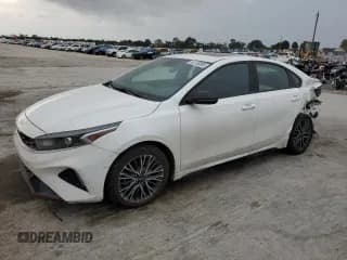 ✅ 2023 Kia Forte GT-Line • VIN: 3KPF54AD9PE645235 • Лот: 82108585. Опубликован ранее на Copart с пробегом 80 670 миль. Бесплатный доступ к архиву аукционных продаж из США и подробный отчёт об истории автомобиля на DreamBid. Изображение 1.