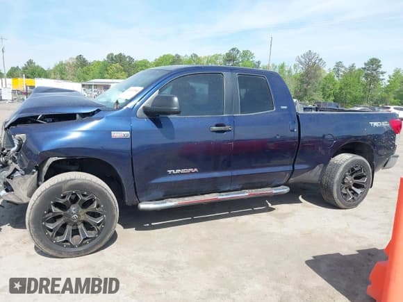 ✅ 2010 Toyota Tundra • VIN: 5TFRY5F18AX086292 • Lot: 42112200. Listed on IAAI with 306,701 mi. Free auction sales archive from the USA and detailed vehicle history report at DreamBid. Image 14.