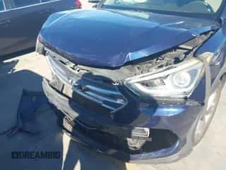 2017 Hyundai Santa Fe 2.4L z VIN 5XYZT3LB6HG467586, wystawiony jako IAAI lot #43585328 z przebiegiem 84 065 mil mil oraz . Historia ofert i sprzedaży dostępna na DreamBid. Obrazek 6.