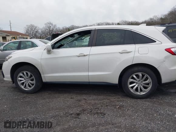 ✅ 2017 Acura RDX • VIN: 5J8TB4H36HL000755 • Lot: 39087074. Listed on IAAI with 101,511 mi. Free auction sales archive from the USA and detailed vehicle history report at DreamBid. Image 14.