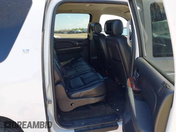 2014 Chevrolet Suburban LT z VIN 1GNSCJE0XER245963, wystawiony jako IAAI lot #43110230 z przebiegiem 160 648 mil mil oraz . Historia ofert i sprzedaży dostępna na DreamBid. Obrazek 8.