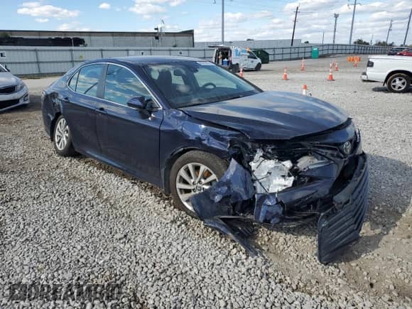 2022 Toyota Camry LE с VIN 4T1R11BK3NU060035, выставлен на аукционе Copart как лот 89728225 с пробегом 25 477 миль миль и Списание • Salvage title. История ставок и продаж доступна на DreamBid. Изображение 4.