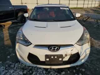2013 Hyundai Veloster w/Gray Int с VIN KMHTC6AD7DU142512, выставлен на аукционе Copart как лот 64877744 с пробегом 91 963 миль миль и Списание • Salvage title. История ставок и продаж доступна на DreamBid. Изображение 5.