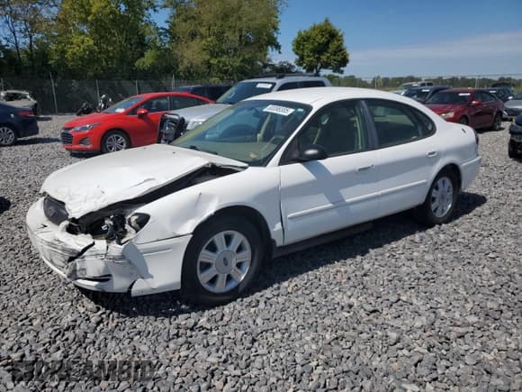 ✅ 2006 Ford Taurus SE • VIN: 1FAFP53256A125309 • Lot: 80096585. Listed on Copart with 243,463 mi. Free auction sales archive from the USA and detailed vehicle history report at DreamBid. Image 1.