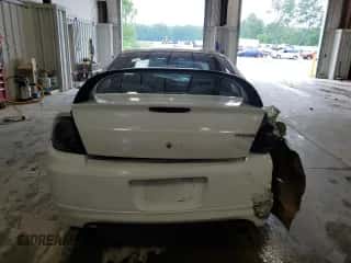 2004 Dodge Neon SRT-4 z VIN 1B3ES66S14D569869, wystawiony jako Copart lot #64377965 z przebiegiem 167 521 mil mil oraz Nie do naprawy • Non repairable. Historia ofert i sprzedaży dostępna na DreamBid. Obrazek 6.