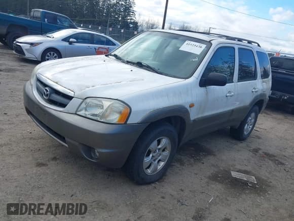 ✅ 2004 Mazda Tribute LX • VIN: 4F2CZ94154KM25671 • Lot: 41525470. Listed on IAAI with 206,805 mi. Free auction sales archive from the USA and detailed vehicle history report at DreamBid. Image 2.