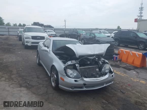 ✅ 2001 Mercedes-Benz SLK 230/320 • VIN: WDBKK65F71F221501 • Lot: 42282368. Listed on IAAI with 123,692 mi. Free auction sales archive from the USA and detailed vehicle history report at DreamBid. Image 1.