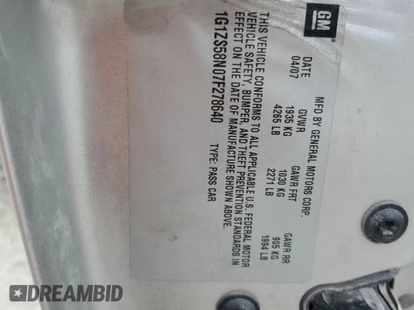 2007 Chevrolet Malibu LS z VIN 1G1ZS58N07F278640, wystawiony jako Copart lot #71106874 z przebiegiem 188 654 mil mil oraz Szkoda całkowita • Salvage title. Historia ofert i sprzedaży dostępna na DreamBid. Obrazek 12.