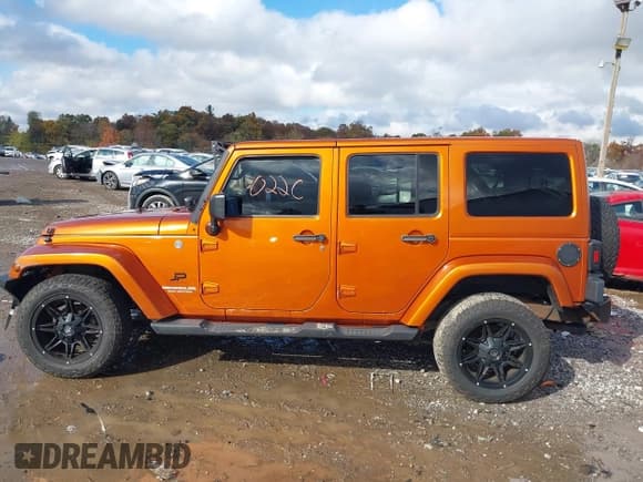 ✅ 2011 Jeep Wrangler Unlimited Sahara • VIN: 1J4BA5H12BL600515 • Лот: 43590220. Опубликован ранее на IAAI с пробегом 101 340 миль. Бесплатный доступ к архиву аукционных продаж из США и подробный отчёт об истории автомобиля на DreamBid. Изображение 14.