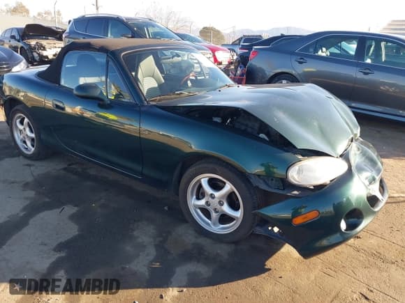 ✅ 2001 Mazda MX-5 Miata • VIN: JM1NB353710205398 • Lot: 41356329. Listed on IAAI with 126,680 mi. Free auction sales archive from the USA and detailed vehicle history report at DreamBid. Image 1.