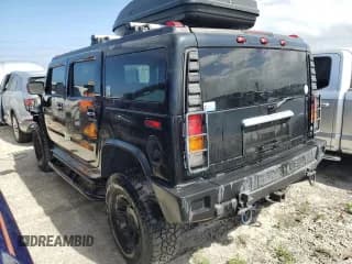✅ 2003 Hummer H2 • VIN: 5GRGN23U33H114427 • Лот: 76528834. Опубликован ранее на Copart с пробегом 133 571 миль. Бесплатный доступ к архиву аукционных продаж из США и подробный отчёт об истории автомобиля на DreamBid. Изображение 2.