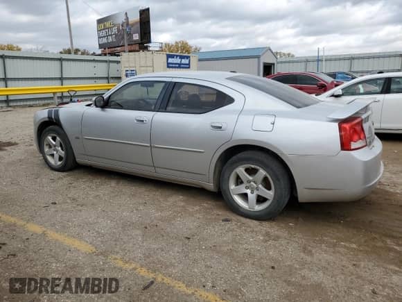 2010 Dodge Charger SXT с VIN 2B3CA3CV6AH197838, выставлен на аукционе Copart как лот 78125904 с пробегом 127 840 миль миль и Списание • Salvage title. История ставок и продаж доступна на DreamBid. Изображение 2.