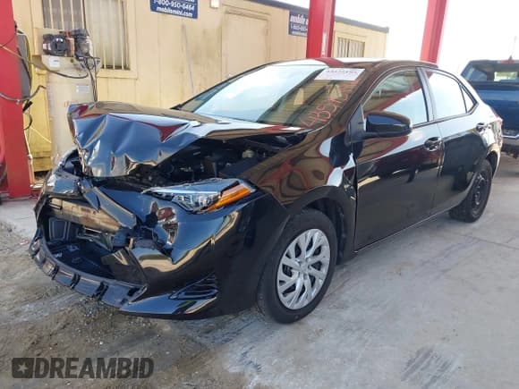 ✅ 2018 Toyota Corolla LE • VIN: 5YFBURHE6JP802304 • Lot: 43575192. Listed on IAAI with 87,309 mi. Free auction sales archive from the USA and detailed vehicle history report at DreamBid. Image 2.