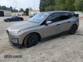 ✅ 2023 BMW iX xDrive50 • VIN: WB523CF0XPCM84949 • Lot: 84989155. Listed on Copart with 32,362 mi. Free auction sales archive from the USA and detailed vehicle history report at DreamBid. Image 1.