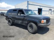 ✅ 1999 GMC Denali • VIN: 1GKEK13R8XR907203 • Lot: 60265025. Listed on Copart with 169,078 mi. Free auction sales archive from the USA and detailed vehicle history report at DreamBid. Image 4.