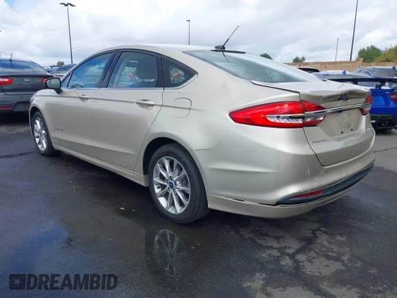 ✅ 2017 Ford Fusion Hybrid SE • VIN: 3FA6P0LU0HR355269 • Lot: 41745299. Listed on IAAI with 97,675 mi. Free auction sales archive from the USA and detailed vehicle history report at DreamBid. Image 3.