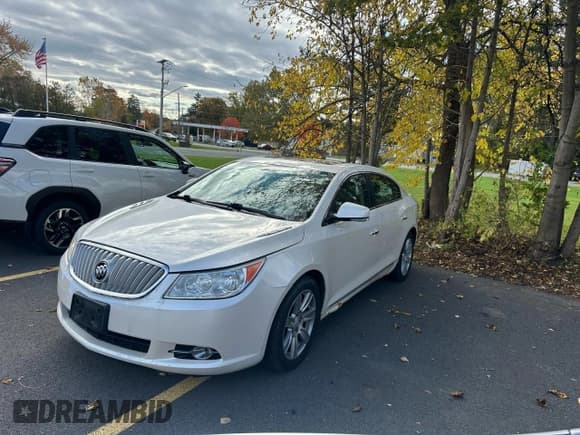 ✅ 2012 Buick LaCrosse Premium 2 • VIN: 1G4GF5E31CF372702 • Lot: 90290445. Listed on Copart with 130,098 mi. Free auction sales archive from the USA and detailed vehicle history report at DreamBid. Image 2.