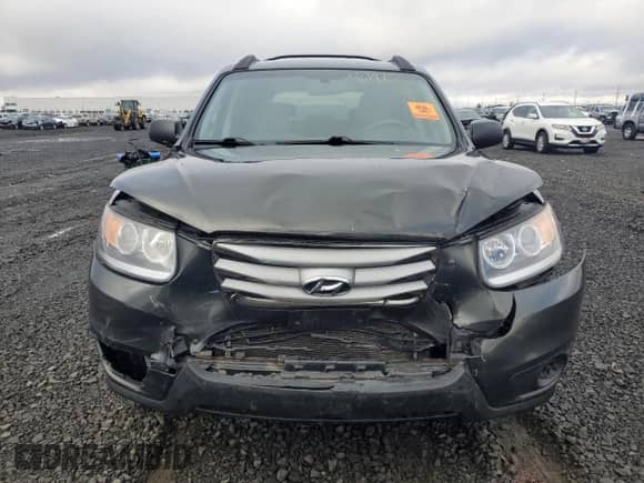 ✅ 2012 Hyundai Santa Fe GLS • VIN: 5XYZGDAB0CG105078 • Лот: 90475405. Размещён на Copart с пробегом 101 439 миль миль. Получите бесплатный доступ к архиву аукционных продаж из США и посмотрите подробный отчёт об истории автомобиля на DreamBid. Изображение 5.