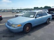 ✅ 2000 Ford Crown Victoria LX • VIN: 2FAFP74W1YX154250 • Лот: 42683350. Опубликован ранее на IAAI с пробегом 267 096 миль. Бесплатный доступ к архиву аукционных продаж из США и подробный отчёт об истории автомобиля на DreamBid. Изображение 17.