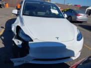 ✅ 2023 Tesla Model Y Long Range • VIN: 7SAYGDEE8PA145812 • Lot: 43535169. Listed on IAAI with 17,781 mi. Free auction sales archive from the USA and detailed vehicle history report at DreamBid. Image 12.