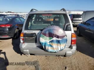 ✅ 2003 Suzuki Vitara • VIN: 2S3TE52V936103483 • Lot: 82235884. Wystawiony na Copart z przebiegiem 173 354 mil. Bezpłatny archiwum sprzedaży aukcyjnych z USA i szczegółowy raport historii pojazdu na DreamBid. Zdjęcie 6.