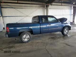 2001 Dodge 1500 с VIN 1B7HC13Y11J515876, выставлен на аукционе Copart как лот 80713664 с пробегом 97 269 миль миль и Списание • Salvage title. История ставок и продаж доступна на DreamBid. Изображение 3.