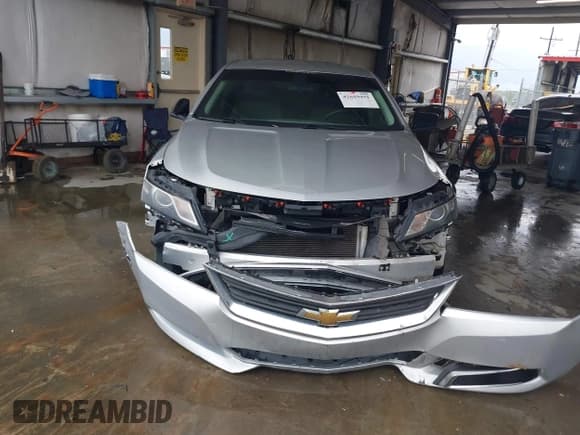 ✅ 2017 Chevrolet Impala LS • VIN: 2G11X5SA0H9158075 • Lot: 42659451. Listed on IAAI with 219,813 mi. Free auction sales archive from the USA and detailed vehicle history report at DreamBid. Image 12.
