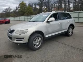 ✅ 2010 Volkswagen Touareg VR6 • VIN: WVGBF7A93AD004028 • Lot: 85649165. Wystawiony na Copart z przebiegiem 124 053 mil. Bezpłatny archiwum sprzedaży aukcyjnych z USA i szczegółowy raport historii pojazdu na DreamBid. Zdjęcie 1.