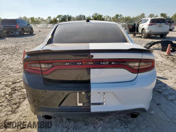✅ 2018 Dodge Charger • VIN: 0K0740032512 • Лот: 85167555. Опубликован ранее на Copart с пробегом 56 499 миль. Бесплатный доступ к архиву аукционных продаж из США и подробный отчёт об истории автомобиля на DreamBid. Изображение 6.
