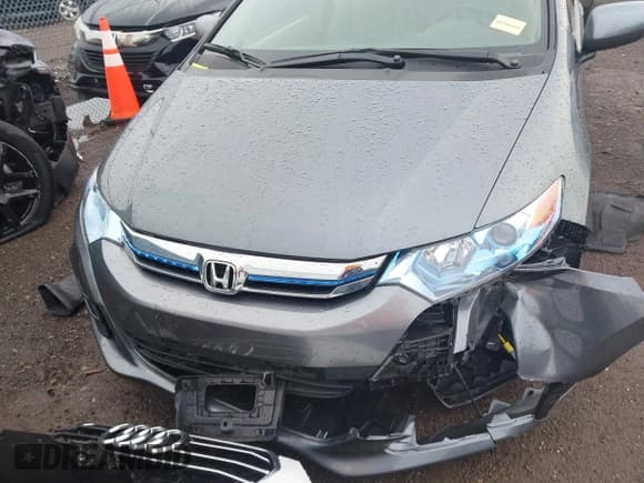 ✅ 2014 Honda Insight LX • VIN: JHMZE2H54ES000081 • Lot: 42622054. Listed on IAAI with 30,097 mi. Free auction sales archive from the USA and detailed vehicle history report at DreamBid. Image 13.