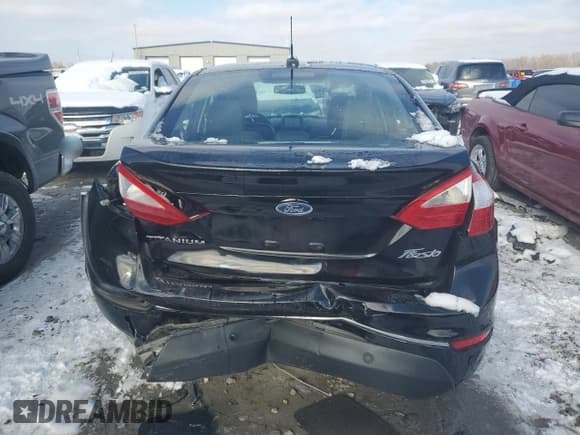 ✅ 2018 Ford Fiesta Titanium • VIN: 3FADP4CJ7JM106345 • Lot: 82435914. Listed on Copart with 83,105 mi. Free auction sales archive from the USA and detailed vehicle history report at DreamBid. Image 6.