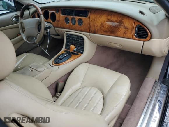 ✅ 2002 Jaguar XK • VIN: SAJDA41C92NA30185 • Lot: 84644315. Wystawiony na Copart z przebiegiem 100 625 mil. Bezpłatny archiwum sprzedaży aukcyjnych z USA i szczegółowy raport historii pojazdu na DreamBid. Zdjęcie 8.