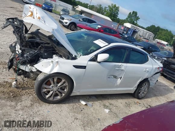 ✅ 2012 Kia Optima EX • VIN: 5XXGN4A61CG072774 • Lot: 42646909. Listed on IAAI with 75,523 mi. Free auction sales archive from the USA and detailed vehicle history report at DreamBid. Image 13.