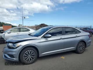 ✅ 2021 Volkswagen Jetta S • VIN: 3VWC57BU9MM041394 • Lot: 64443505. Wystawiony na Copart z przebiegiem 30 098 mil. Bezpłatny archiwum sprzedaży aukcyjnych z USA i szczegółowy raport historii pojazdu na DreamBid. Zdjęcie 1.