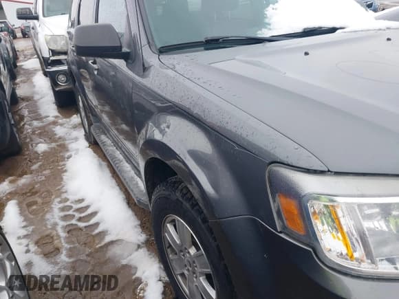 ✅ 2011 Mercury Mariner • VIN: 4M2CN9BG5BKJ03462 • Lot: 41770084. Listed on IAAI with 120,508 mi. Free auction sales archive from the USA and detailed vehicle history report at DreamBid. Image 12.