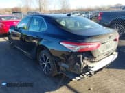 ✅ 2019 Toyota Camry LE • VIN: 4T1B11HK0KU772314 • Lot: 43723108. Wystawiony na IAAI z przebiegiem 74 772 mil. Bezpłatny archiwum sprzedaży aukcyjnych z USA i szczegółowy raport historii pojazdu na DreamBid. Zdjęcie 3.