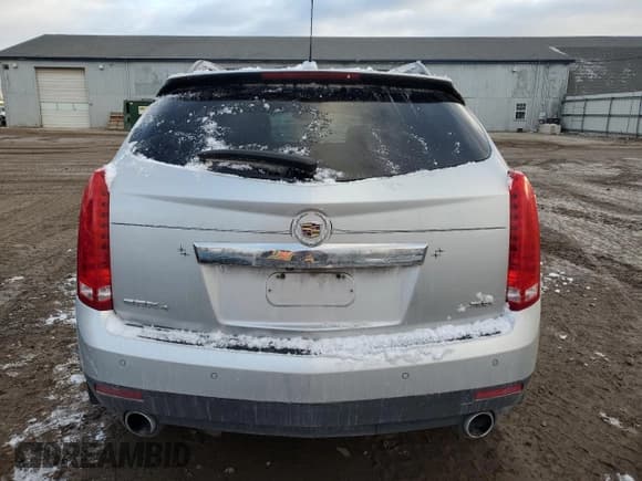 ✅ 2016 Cadillac SRX Luxury Collection • VIN: 3GYFNEE35GS525578 • Лот: 89870495. Опубликован ранее на Copart с пробегом 104 142 миль. Бесплатный доступ к архиву аукционных продаж из США и подробный отчёт об истории автомобиля на DreamBid. Изображение 6.