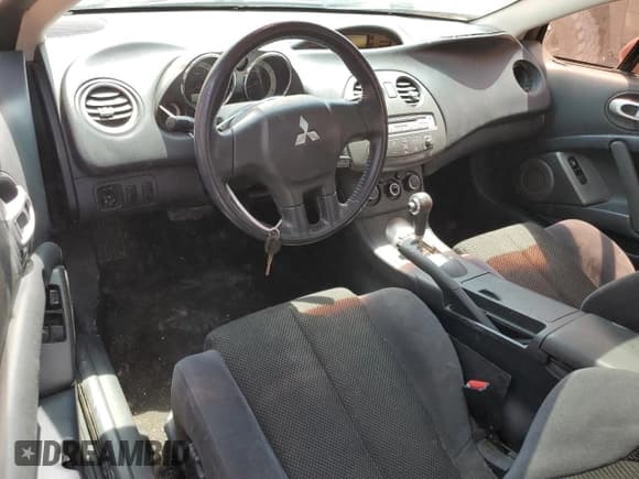 ✅ 2007 Mitsubishi Eclipse GS • VIN: 4A3AK24F37E008015 • Lot: 57789574. Wystawiony na Copart z przebiegiem 141 360 mil. Bezpłatny archiwum sprzedaży aukcyjnych z USA i szczegółowy raport historii pojazdu na DreamBid. Zdjęcie 8.