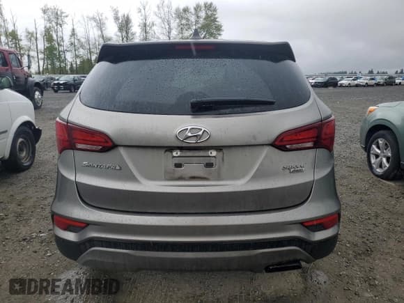 ✅ 2017 Hyundai Santa Fe 2.4L • VIN: 5NMZTDLB6HH002351 • Лот: 52313844. Опубликован ранее на Copart с пробегом Не указан. Бесплатный доступ к архиву аукционных продаж из США и подробный отчёт об истории автомобиля на DreamBid. Изображение 6.