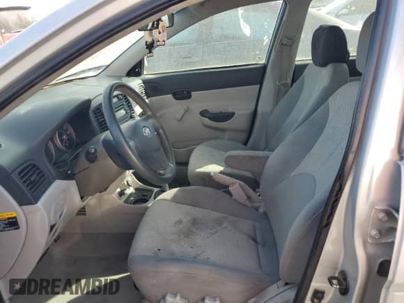 2007 Hyundai Accent GLS z VIN KMHCN46CX7U102105, wystawiony jako Copart lot #65793504 z przebiegiem 213 972 mil mil oraz Szkoda całkowita • Salvage title. Historia ofert i sprzedaży dostępna na DreamBid. Obrazek 7.