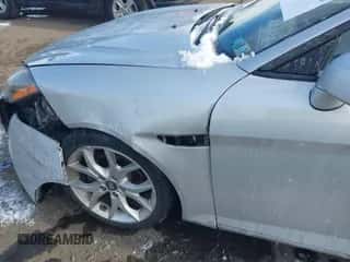 2007 Hyundai Tiburon GT z VIN KMHHN66F97U250757, wystawiony jako IAAI lot #41363768 z przebiegiem 95 365 mil mil oraz . Historia ofert i sprzedaży dostępna na DreamBid. Obrazek 6.